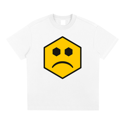 Hexagonk sad face graphic tee showing a yellow hexagon character with a downturned mouth and neutral eyes