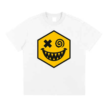 Hexagonk unsettling grin graphic tee featuring crossed and spiral eyes with sharp teeth in a chaotic expression